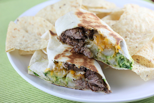 Grilled steak burrito with chips