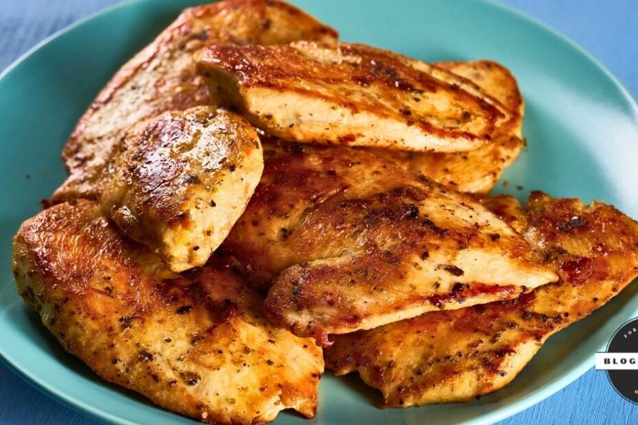 Unbreaded seasoned chicken tenderloins on a plate