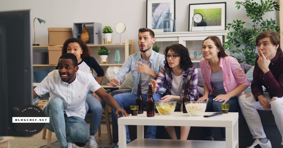 People watching TV during game-day party