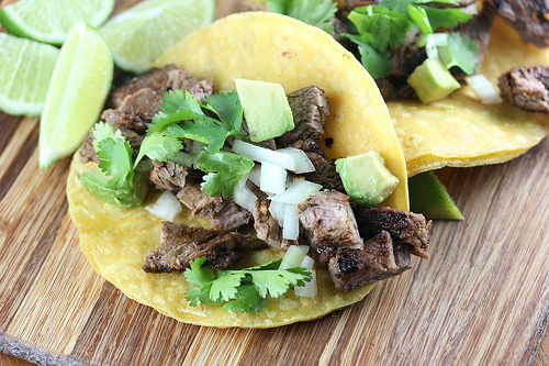 Grilled beef taco with avocado and cilantro