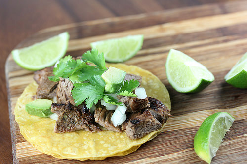 Grilled beef taco with avocado and cilantro