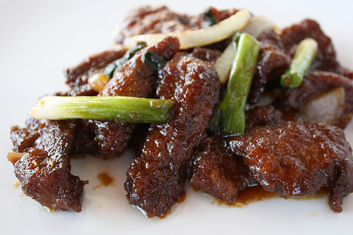 Tender Mongolian beef topped with sliced scallions