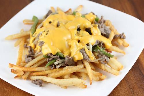Cheesesteak fries topped with cheese