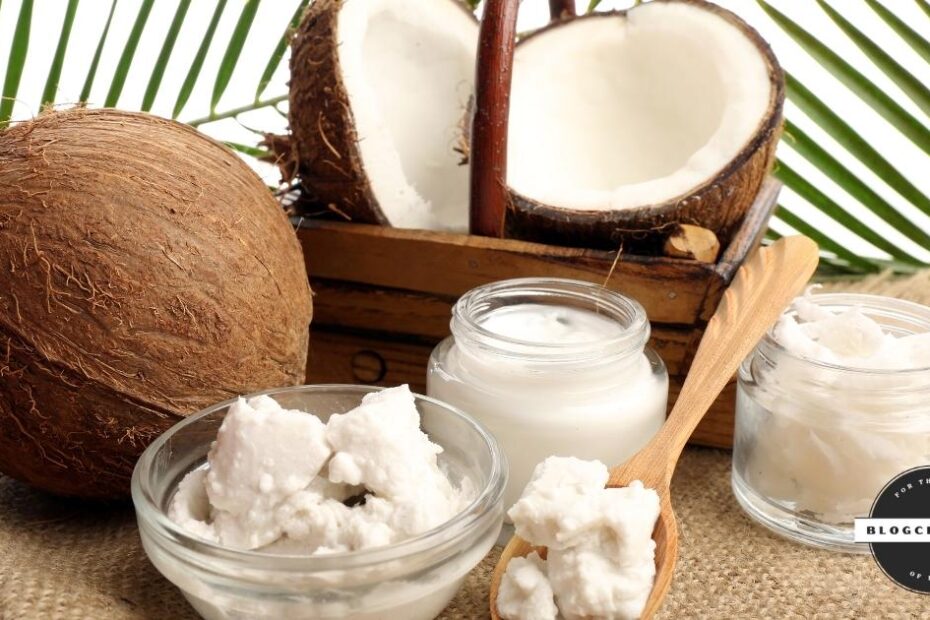 Coconut cream in glass bowl with coconuts