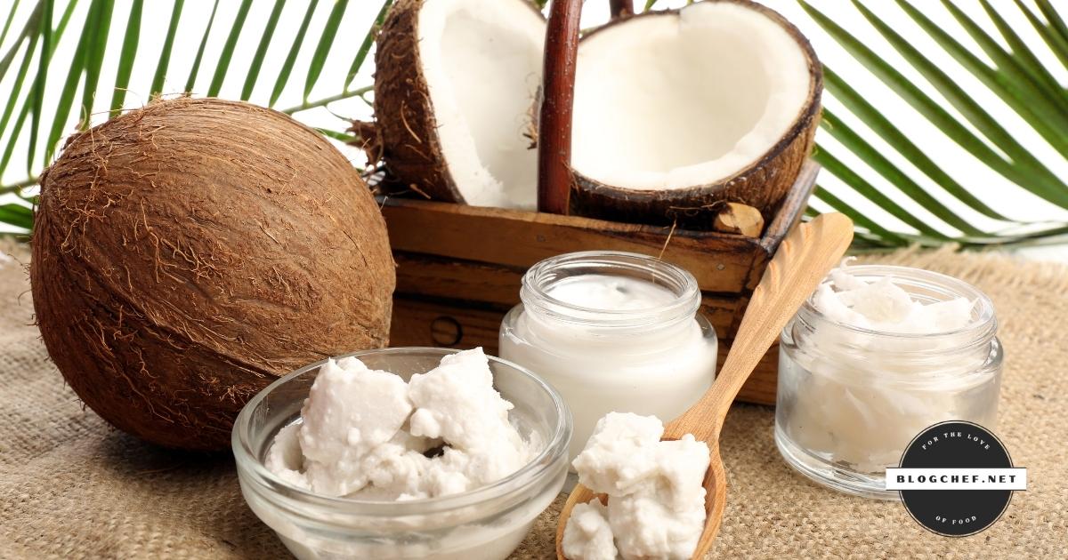Coconut cream in glass bowl with coconuts