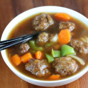 Beef meatball soup with carrots and peppers