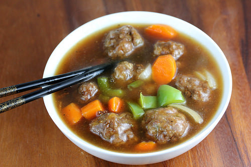 Beef meatball soup with carrots and peppers