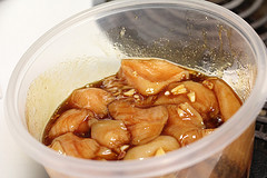 Chicken marinating in a soy garlic mixture