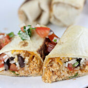 Sliced chicken burrito with fresh salsa