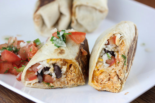 Chicken burrito filled with rice and beans