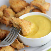 Crispy chicken nugget dipped in sauce