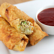 Chicken egg rolls served with dipping sauce