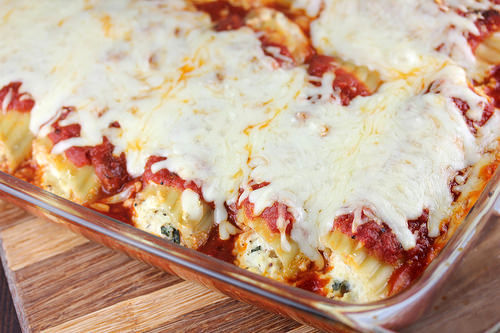 Chicken parmesan manicotti baked with marinara and cheese