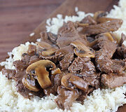 Close-up of beef and mushrooms on rice