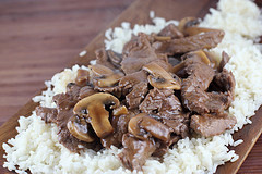 Close-up of beef and mushrooms on rice