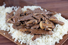 Beef and mushroom stir-fry spooned over rice