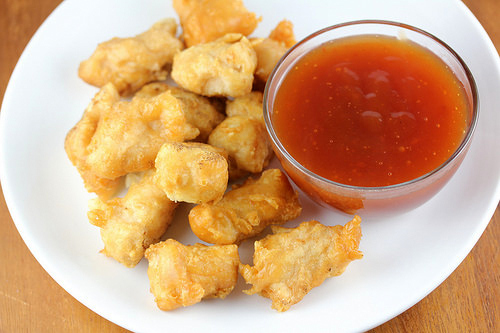 Fried Chinese chicken balls served with sweet and sour sauce