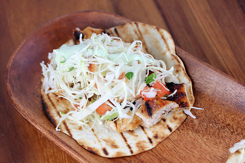 Chipotle chicken tacos with cabbage slaw on warm flatbread