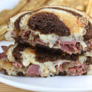 Corned beef grilled cheese sandwich with melted cheese on marbled rye