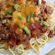 Close-up of cheesy cowboy spaghetti with bacon