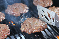 Crunchburger patties cooking on the grill