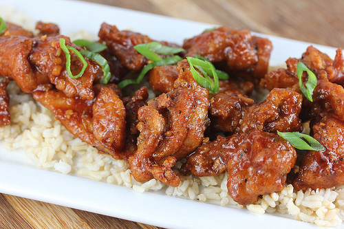 Dragon chicken garnished with sliced green onions