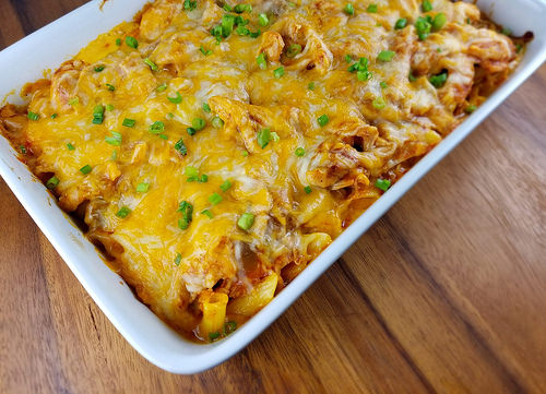 Baked enchilada chicken penne topped with melted cheese