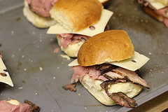 French dip sliders with roast beef and Swiss cheese