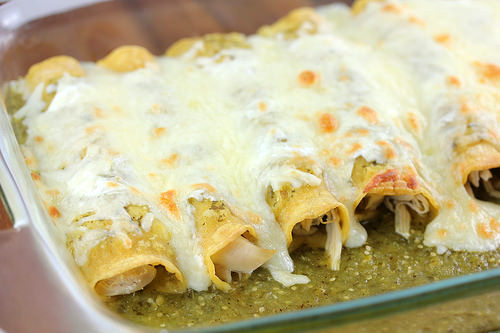 Green chicken enchiladas with melted cheese