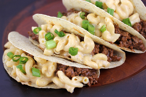 Close up of mac and cheese tacos on plate