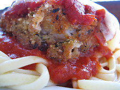 Close-up of crispy chicken with sauce