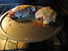 Chicken parmesan baking on a sheet