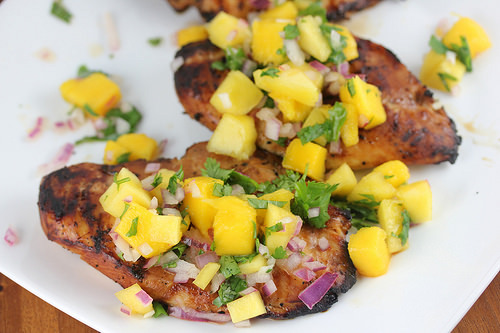 Grilled chicken marinated in soy ginger sauce, garnished with fresh cilantro