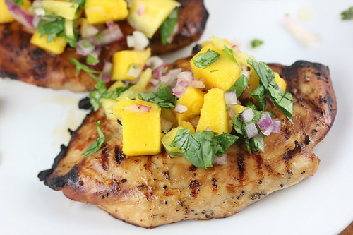 Grilled chicken topped with fresh watermelon salsa, red onion, cilantro, and lime