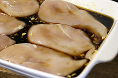 Chicken marinating in asian sauce