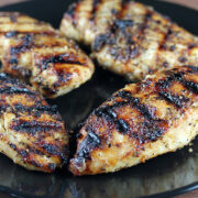 Grilled Montreal chicken breasts on plate
