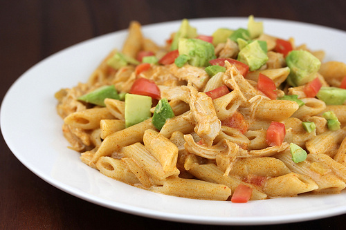 Creamy chicken enchilada pasta on plate