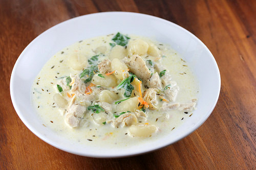 Creamy chicken gnocchi soup in a white bowl