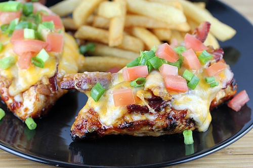 Chicken monterey topped with bacon cheese and tomatoes