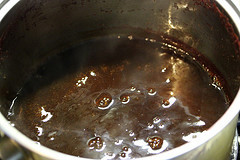 Honey bbq sauce simmering in saucepan