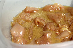 Chicken marinating in kung pao sauce