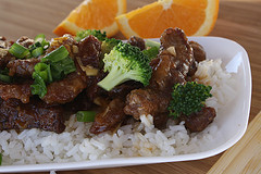 Orange beef with broccoli on white rice