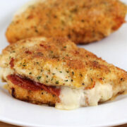 Pepperoni stuffed chicken breast with melted cheese