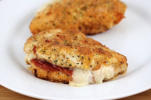 Pepperoni stuffed chicken breast with melted cheese
