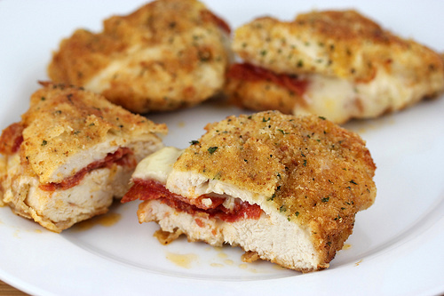 Pepperoni stuffed chicken breasts sliced open