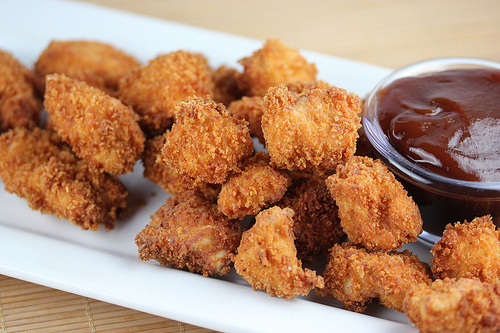 Popcorn chicken served with dipping sauce