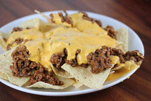Close-up of cheesy sloppy joe nachos on plate