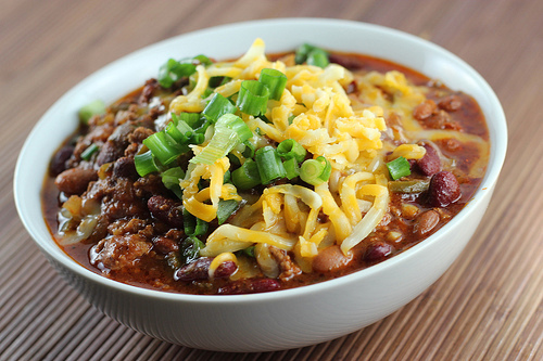 Hearty slow cooker chili with beans and melted cheese