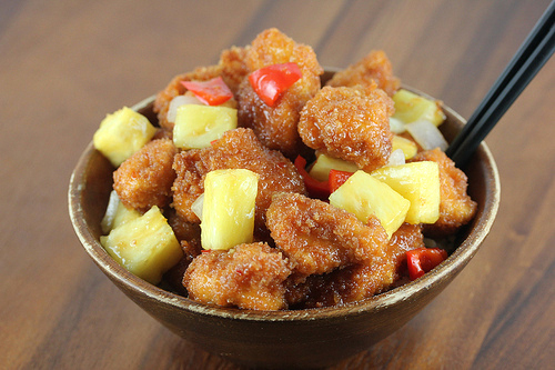 Sweet fire chicken served with pineapple chunks