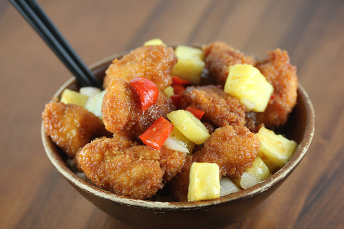 Sweet fire chicken with pineapple in bowl